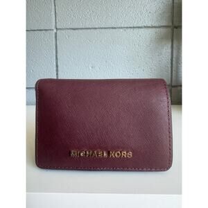 Women’s Michael Kors Jet Set Travel Wallet in Wine Burgundy Pebble Leather